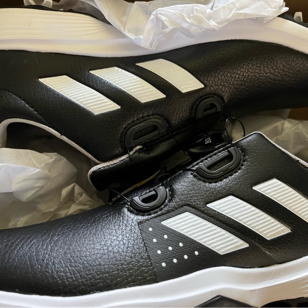 Brand new with tags Adidas Boys Golf shoes. Size 6.